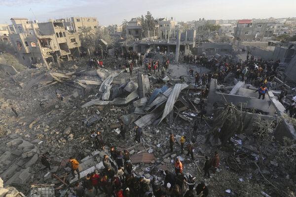 Palestinians look at a mosque destrooyed in an Israeli strike in Rafah, Gaza Strip on Wednesday (Picture: AP Photo/Hatem Ali)